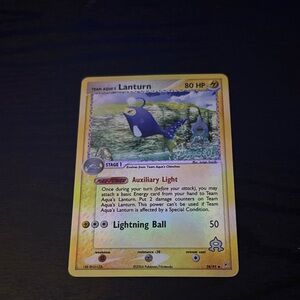 Team Aqua's Lanturn Pokémon Card